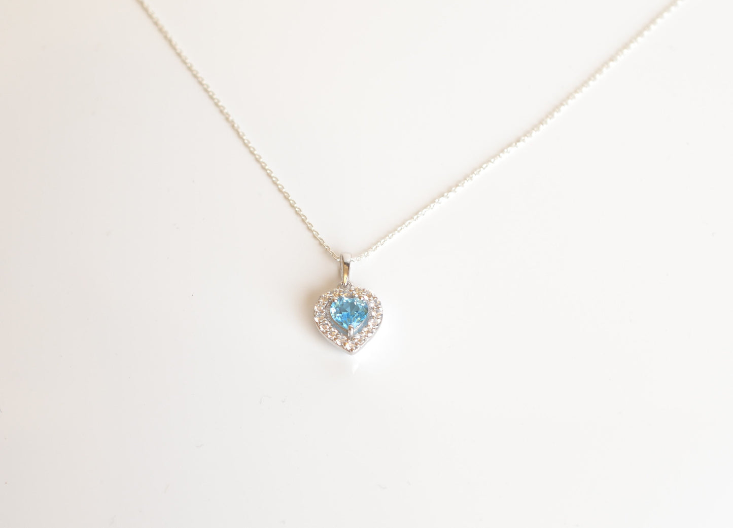 Sterling Silver Necklace with Blue Topaz Heart Pendant