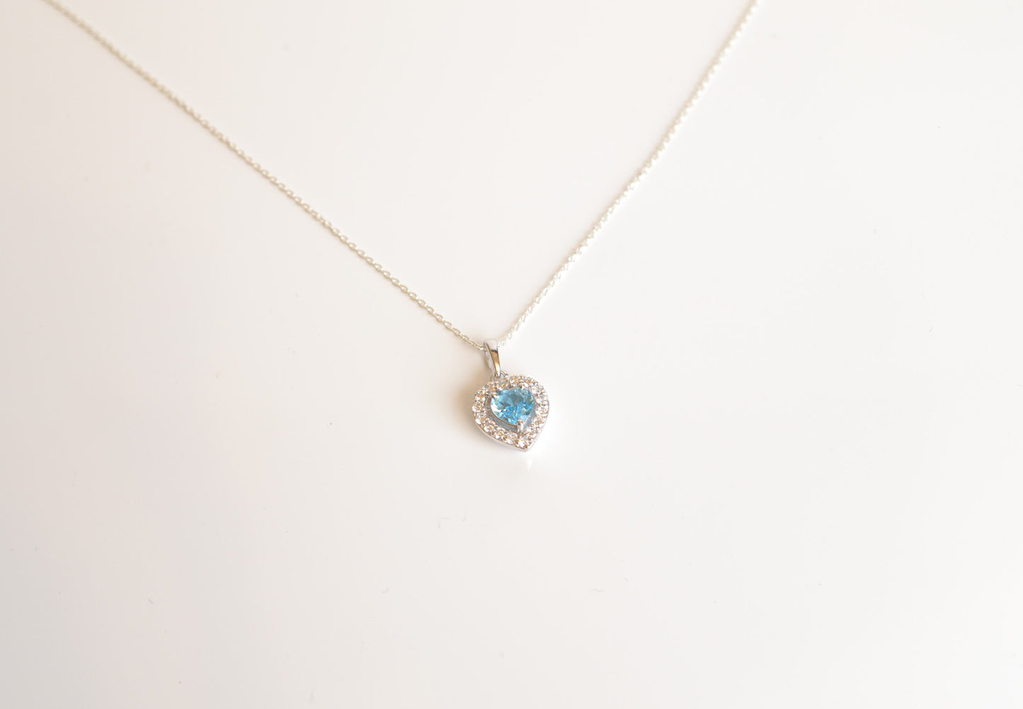 Sterling Silver Necklace with Blue Topaz Heart Pendant